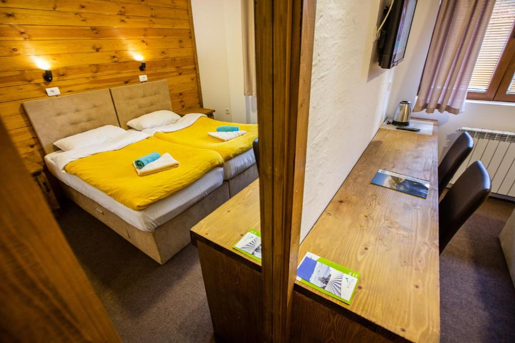 Postel nebo postele na pokoji v ubytování Apartments Tango