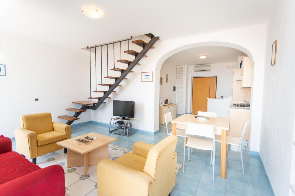 A seating area at LUIMAR Holiday House