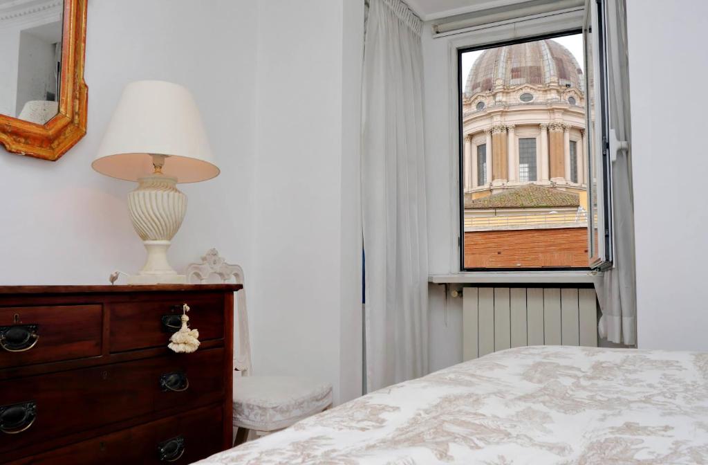Posteľ alebo postele v izbe v ubytovaní RomeAsYouLike - Arancio Apartments N°9