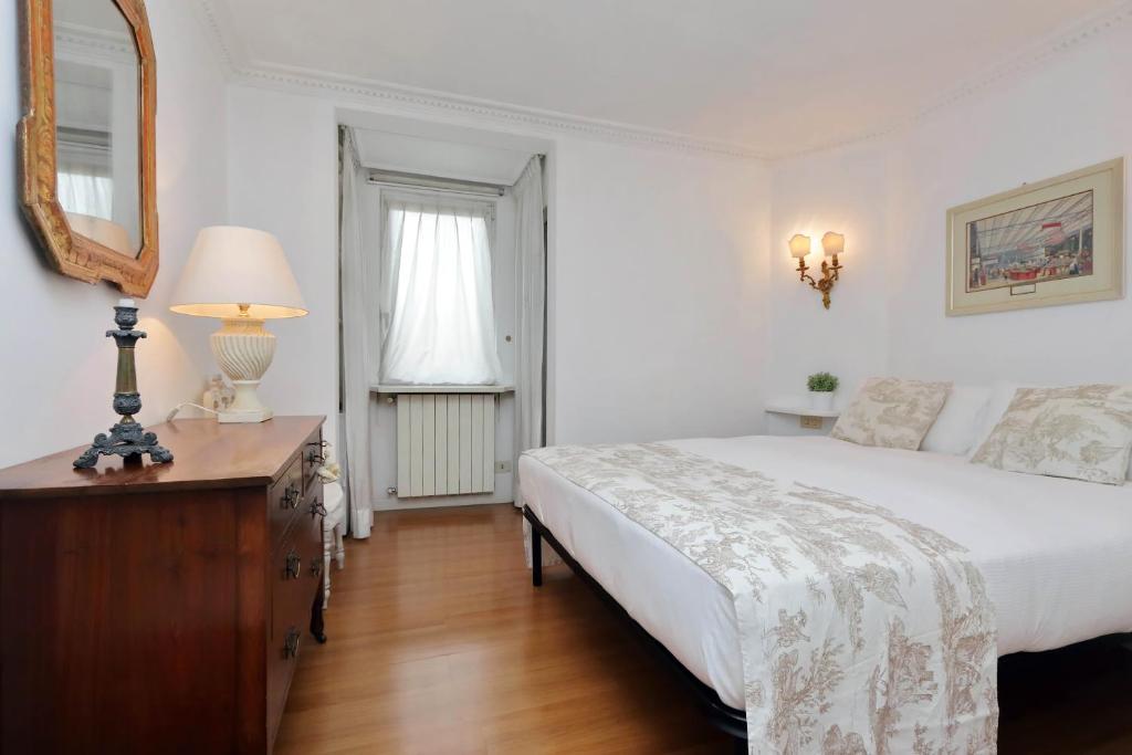 Posteľ alebo postele v izbe v ubytovaní RomeAsYouLike - Arancio Apartments N°9