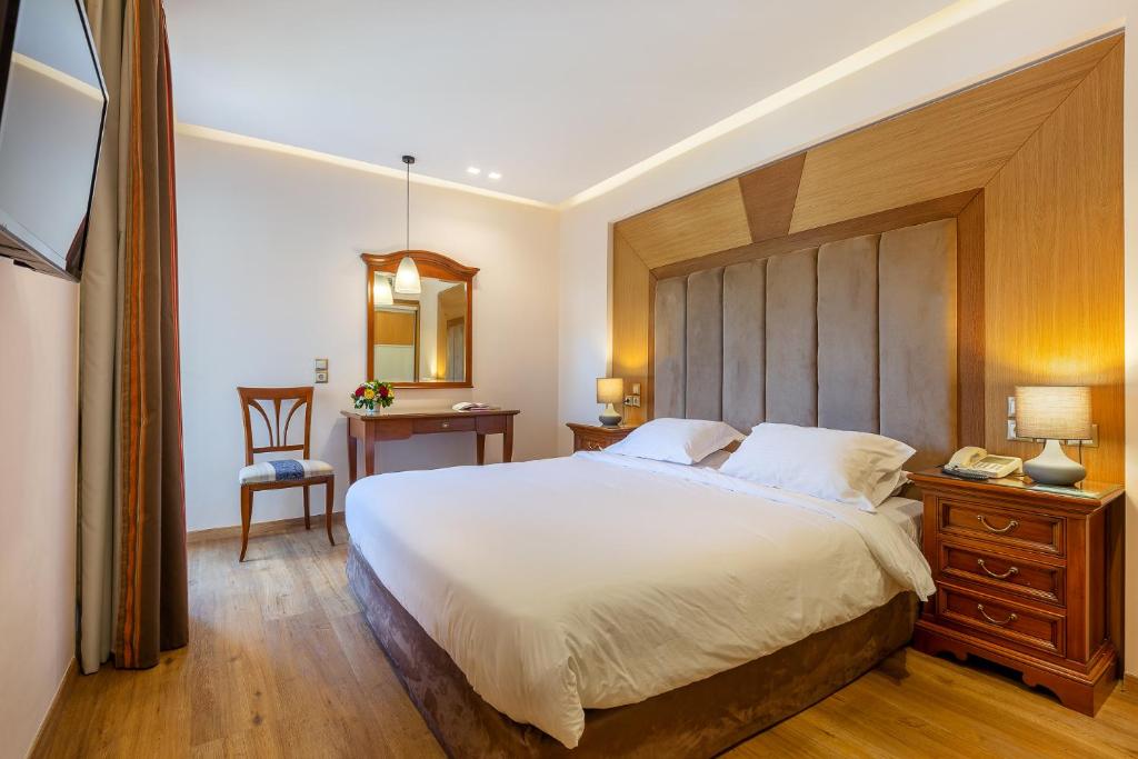 Postel nebo postele na pokoji v ubytování Oasis Hotel Apartments