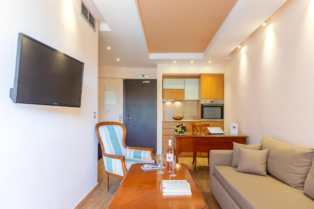 Kuchyň nebo kuchyňský kout v ubytování Oasis Hotel Apartments