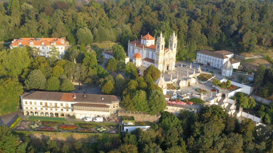 an aerial view of a large building in a forest at Hotel do Parque in Braga