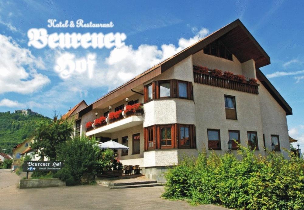 a building with a sign in front of it at Beurener Hof in Beuren