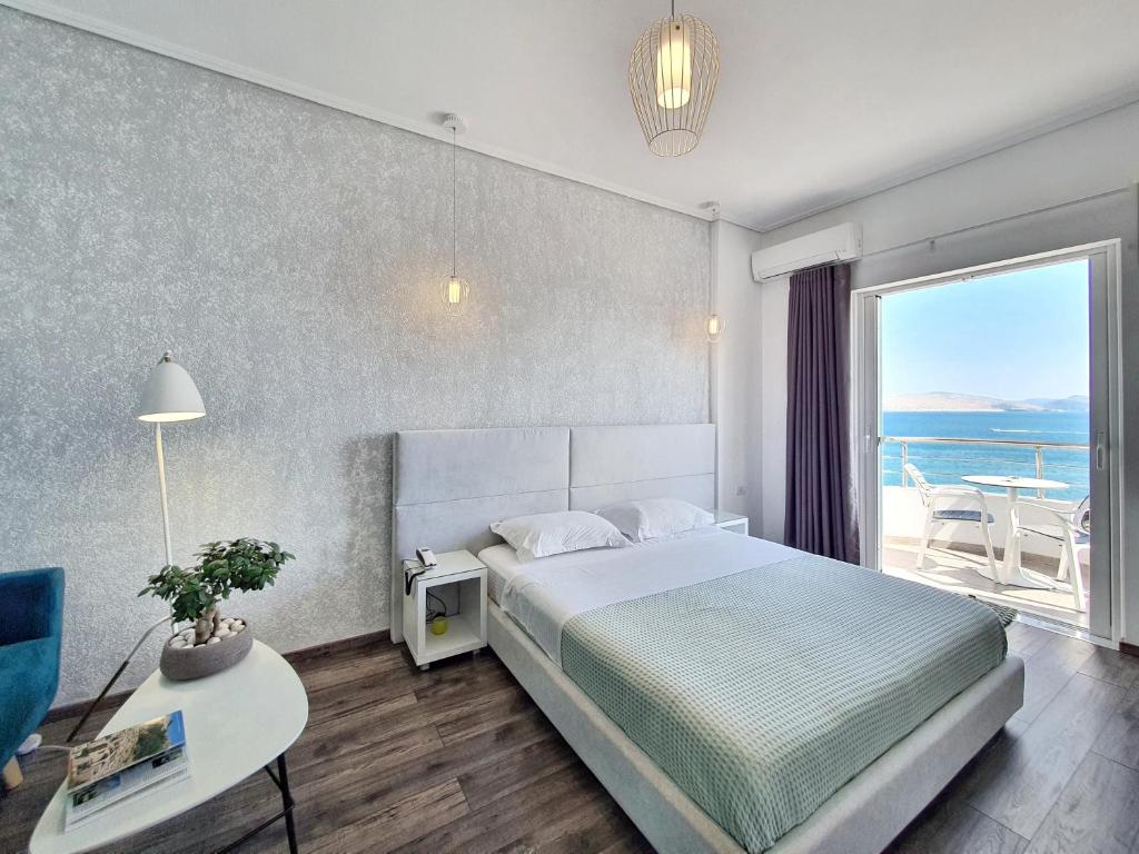 Postel nebo postele na pokoji v ubytování Hotel JoAn