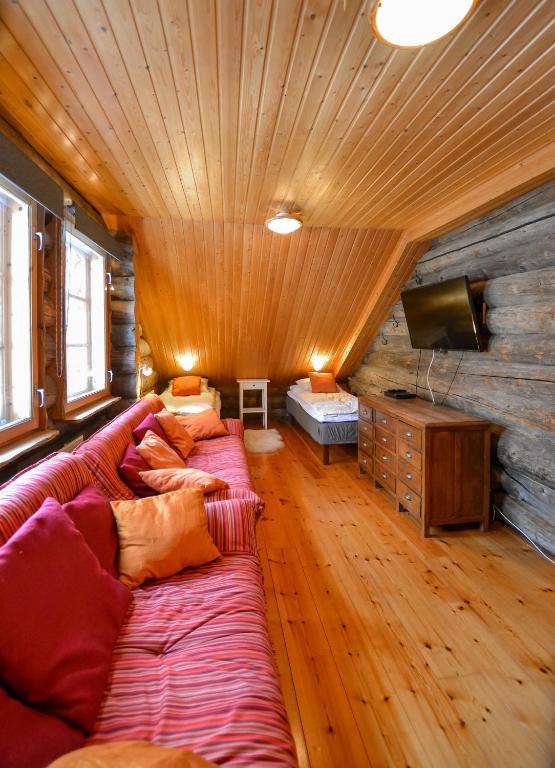 Postel nebo postele na pokoji v ubytování Ylläshilla Cottage