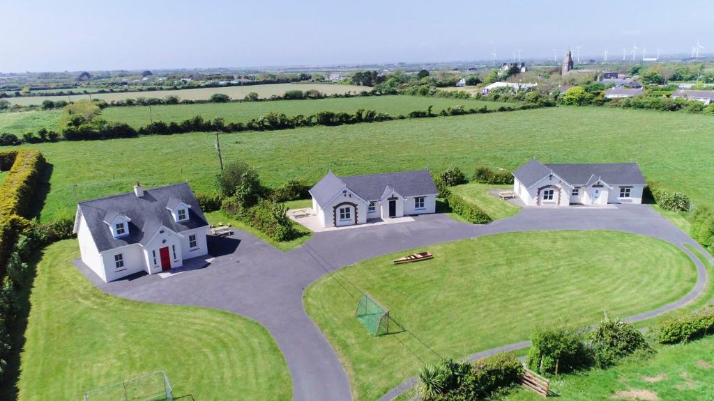an overhead view of a house with a large yard at Kilmore Cottages Self - Catering in Kilmore Quay