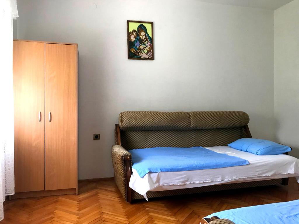Postel nebo postele na pokoji v ubytování Apartments KRAJA