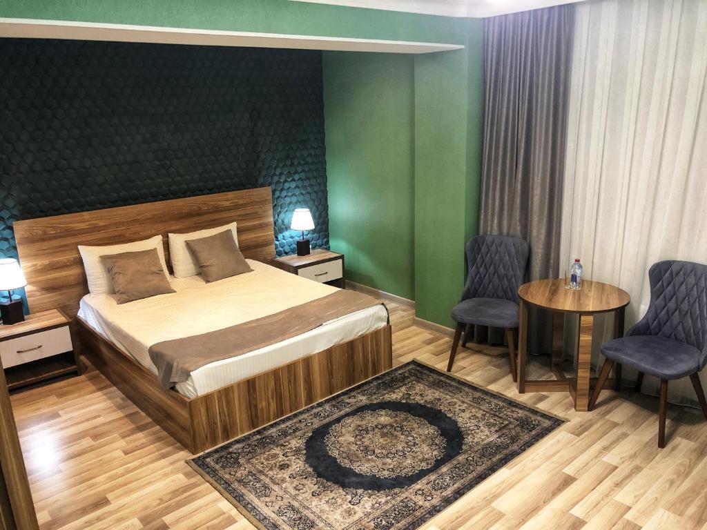 Posteľ alebo postele v izbe v ubytovaní Gallery Lux Hotel Baku