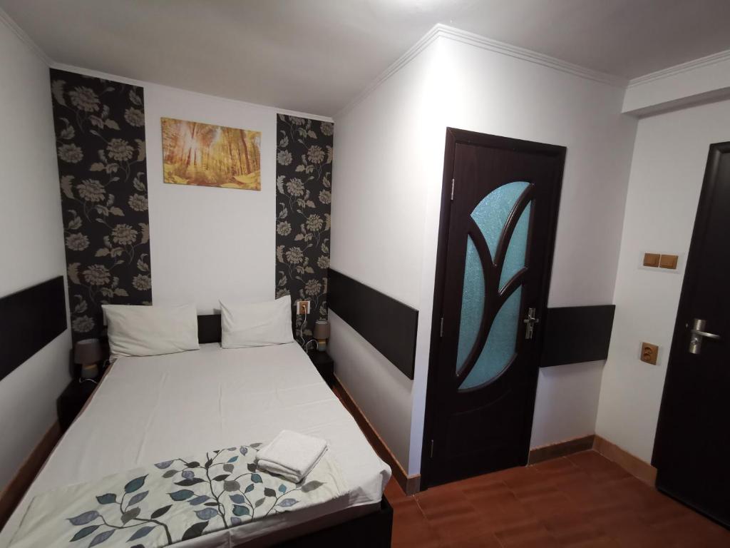 Postel nebo postele na pokoji v ubytování Joe Hostel