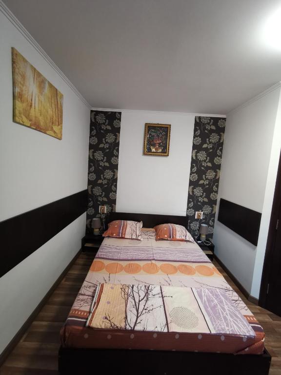 Postel nebo postele na pokoji v ubytování Joe Hostel