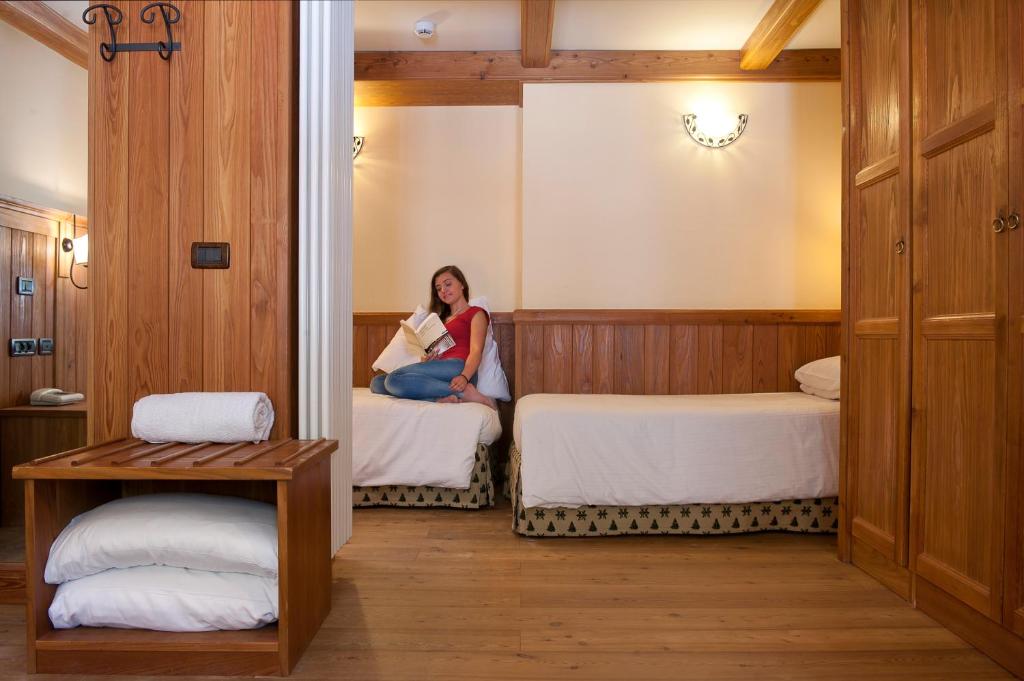 Postel nebo postele na pokoji v ubytování Hotel Castor