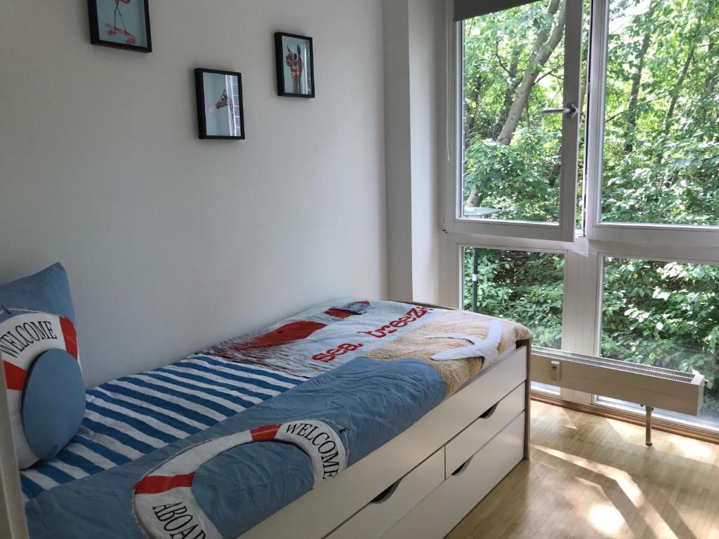 Postel nebo postele na pokoji v ubytování Neue FEWO Juventia (87 m²) - Neuseenland ganz nah!