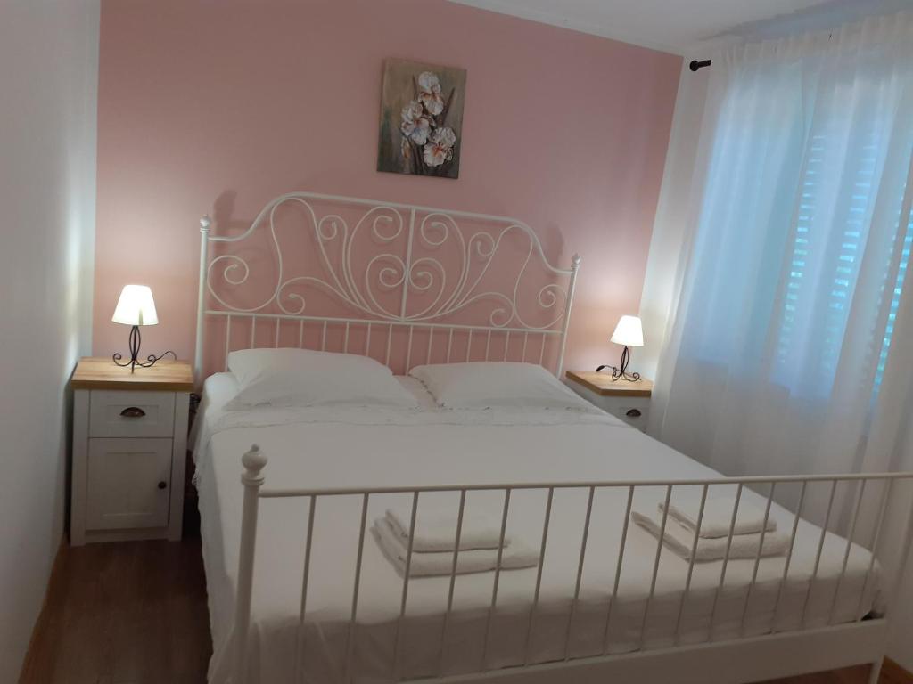 Postel nebo postele na pokoji v ubytování Apartman Jasa