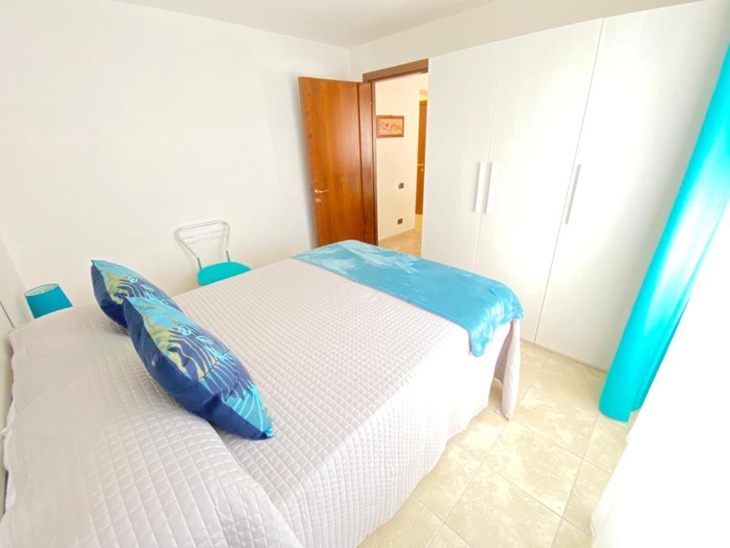 Postel nebo postele na pokoji v ubytování VINTAGE HOME Zona Ospedale