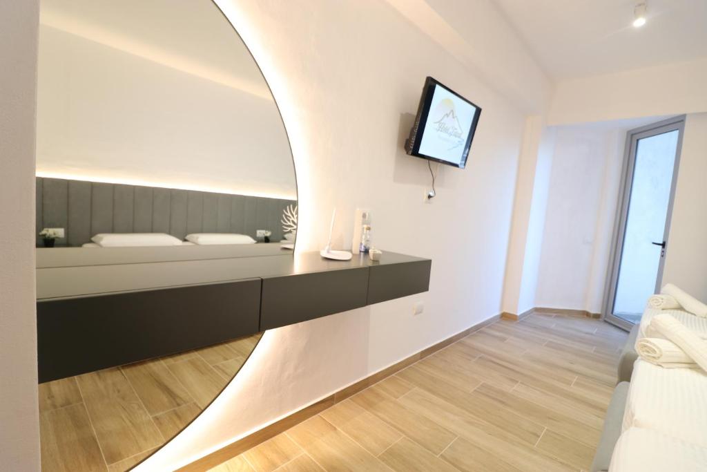 Postel nebo postele na pokoji v ubytování Hotel Tatzati 2