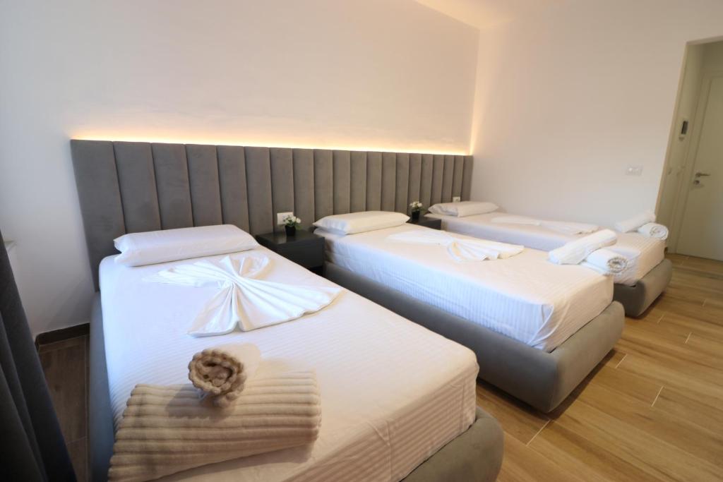 Postel nebo postele na pokoji v ubytování Hotel Tatzati 2