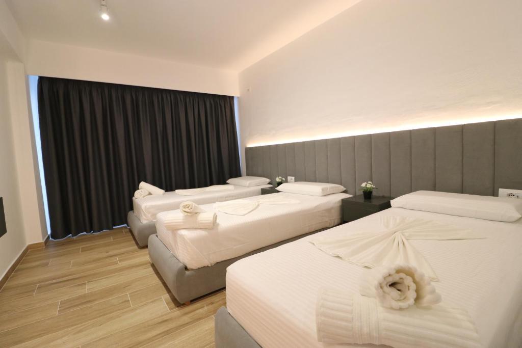 Postel nebo postele na pokoji v ubytování Hotel Tatzati 2