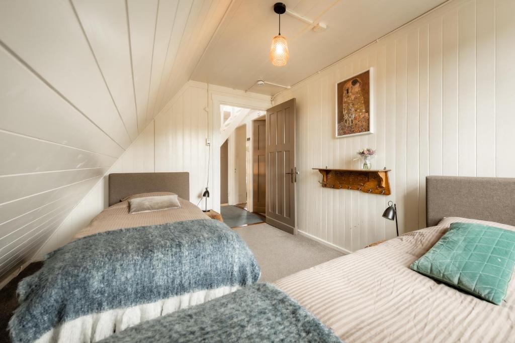 Postel nebo postele na pokoji v ubytování Villa Zwolle Centraal