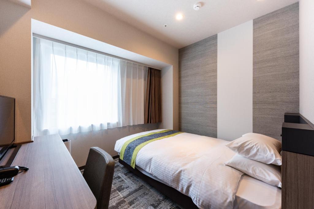 TV a/nebo společenská místnost v ubytování Hotel Kazusaya