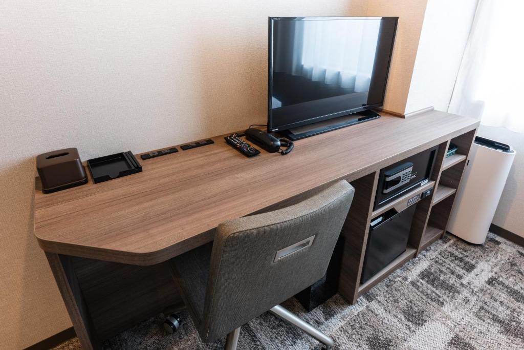 TV a/nebo společenská místnost v ubytování Hotel Kazusaya