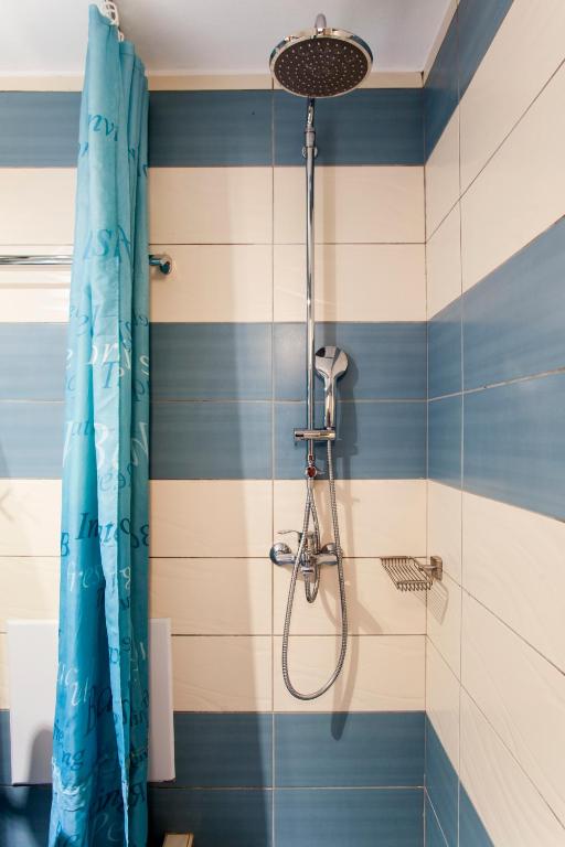 Koupelna v ubytování Mythos Suites Diskos
