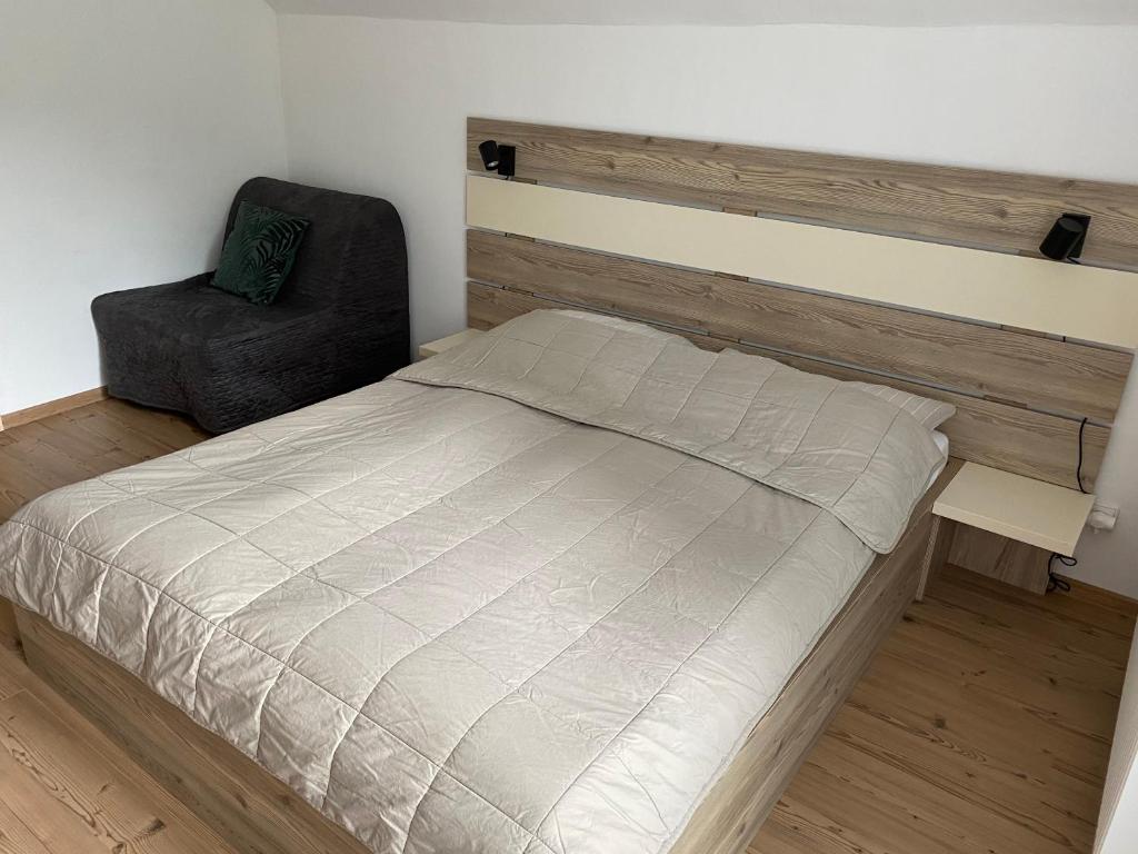 Postel nebo postele na pokoji v ubytování Vila Bellis