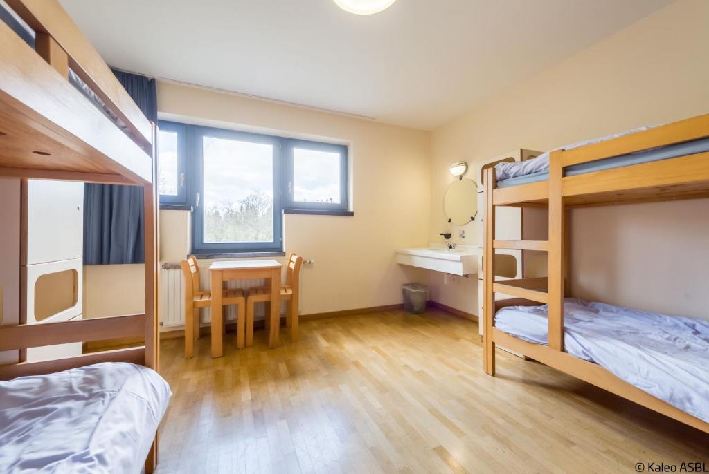 Postel nebo postele na pokoji v ubytování Gîte Kaleo Ovifat