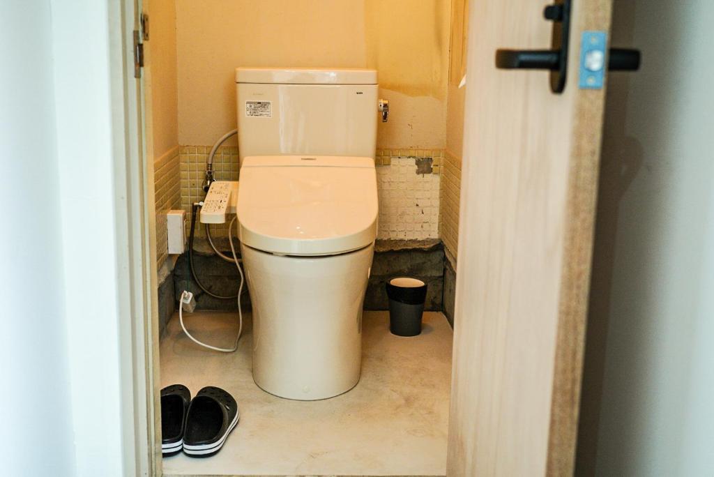 Koupelna v ubytování Arashima Hostel