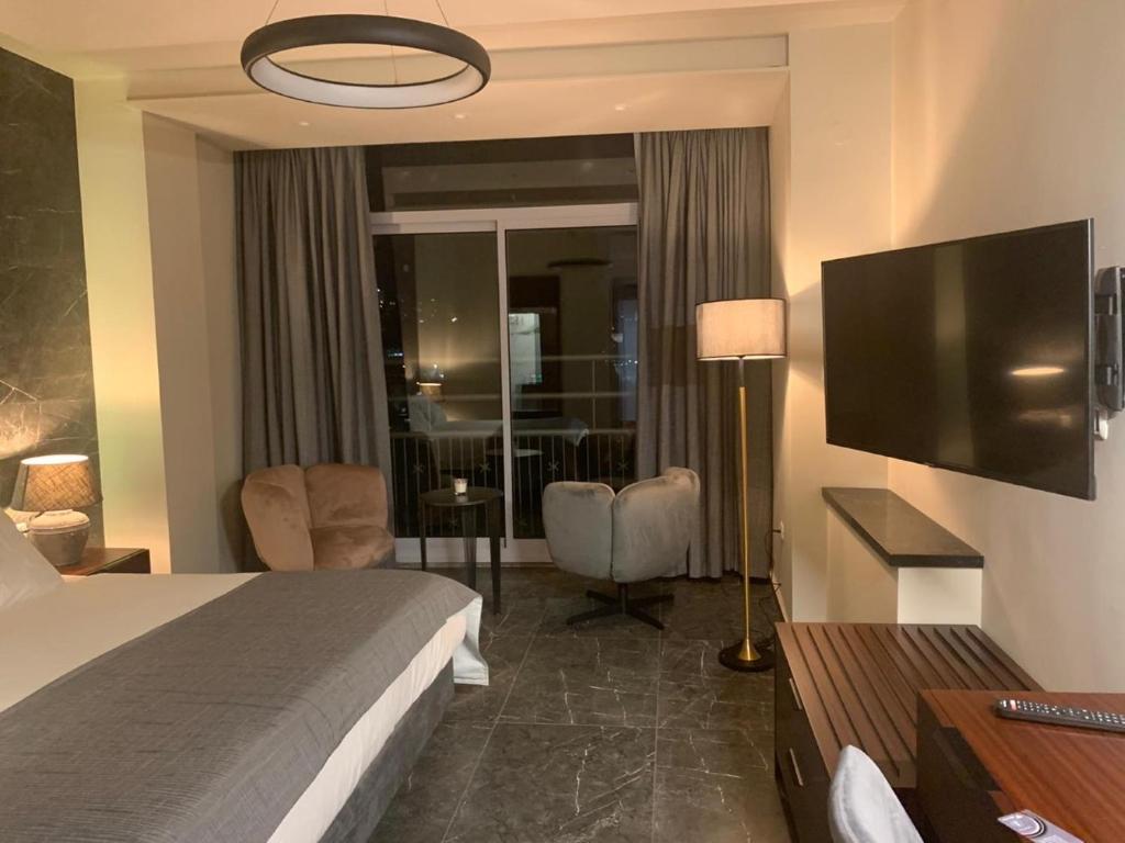 TV a/nebo společenská místnost v ubytování Tabar Hotel