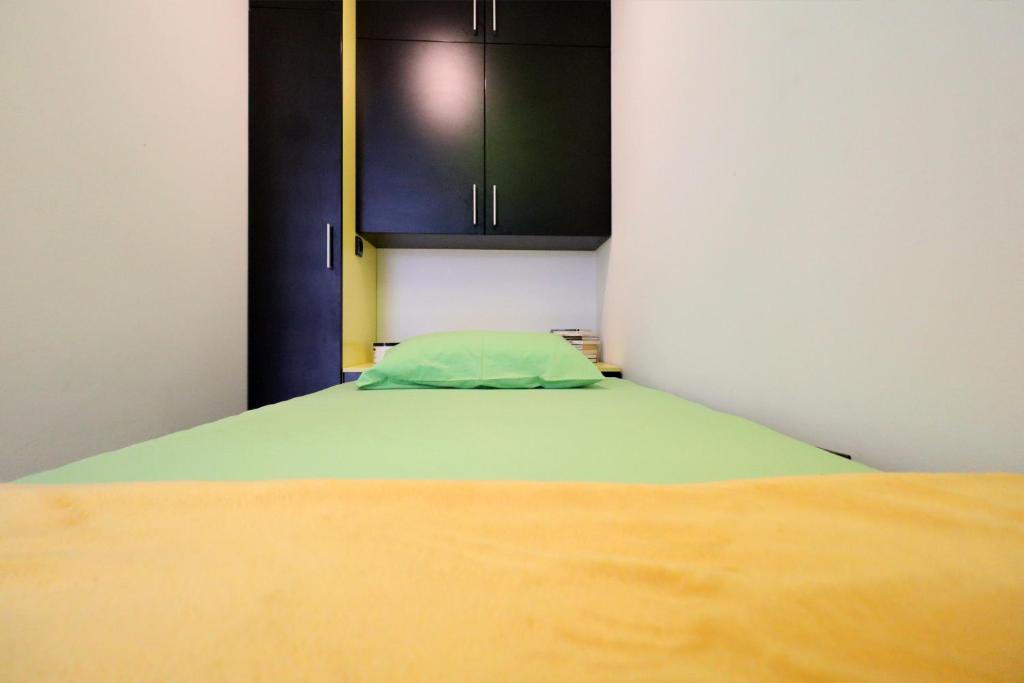 Rúm í herbergi á Apartman Vista in Diamond Hill
