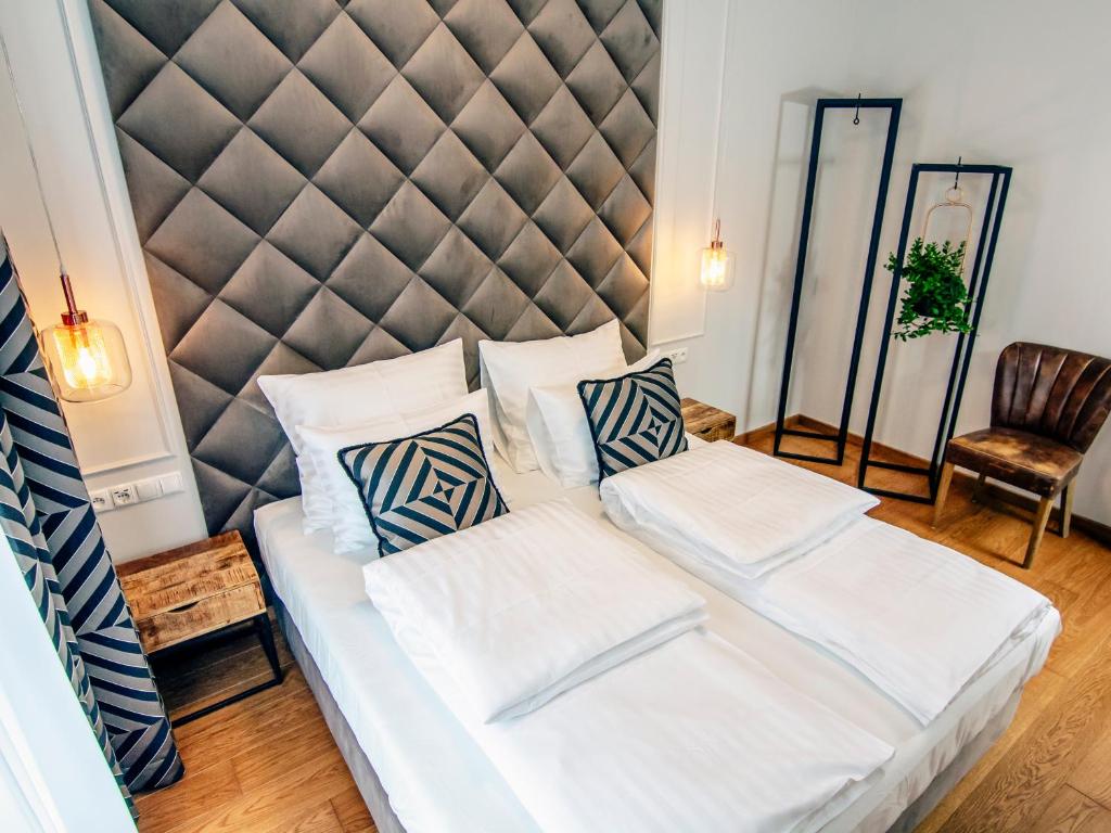 Кровать или кровати в номере EL Apartments - Orion