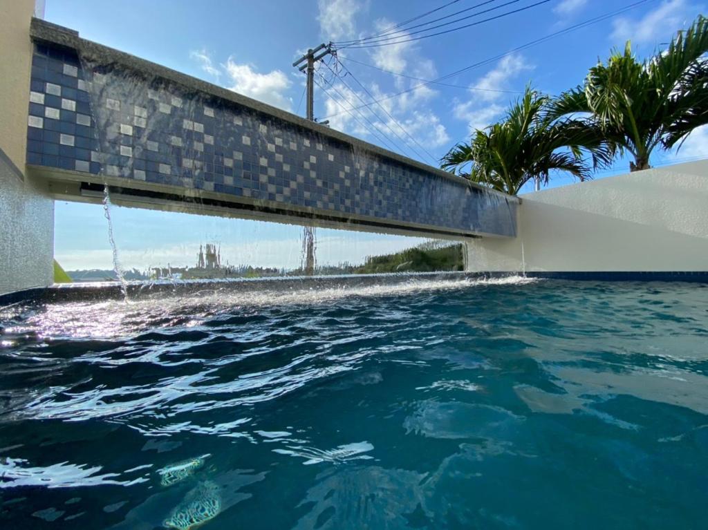 Der Swimmingpool an oder in der Nähe von KEN KEN VILLA YUUMODORO