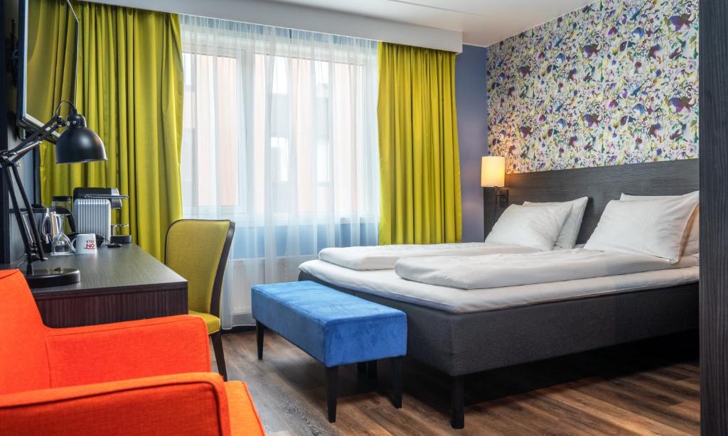 Postel nebo postele na pokoji v ubytování Thon Hotel Tromsø