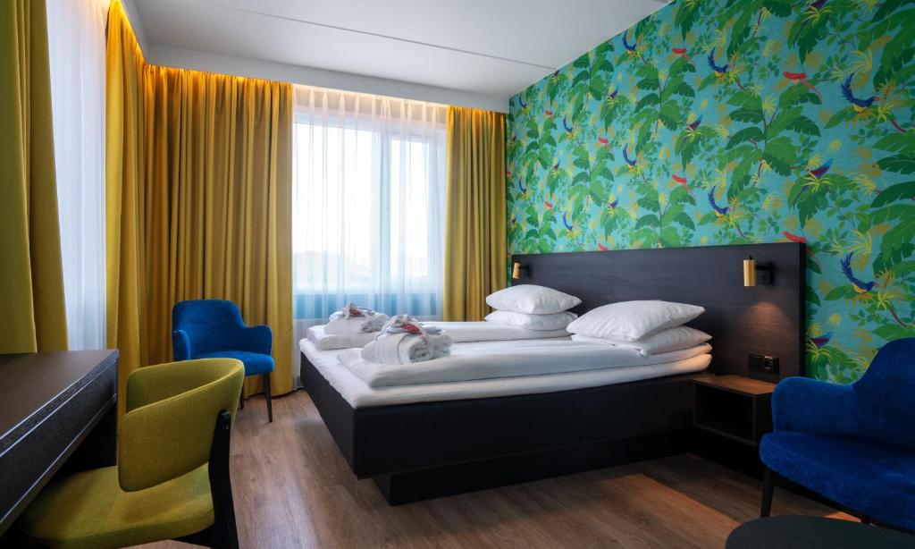 Postel nebo postele na pokoji v ubytování Thon Hotel Alta