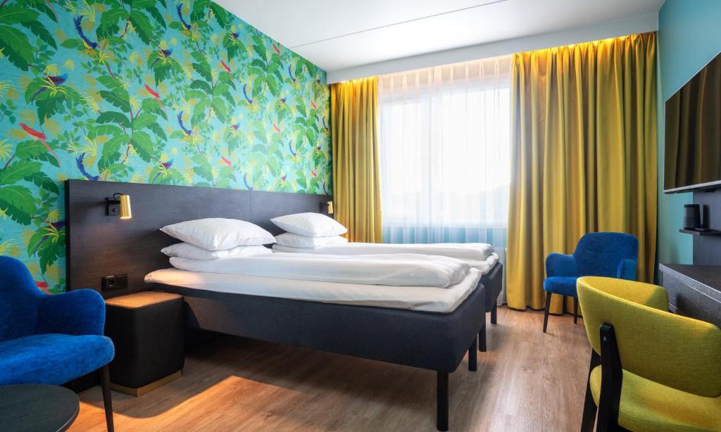 Postel nebo postele na pokoji v ubytování Thon Hotel Alta