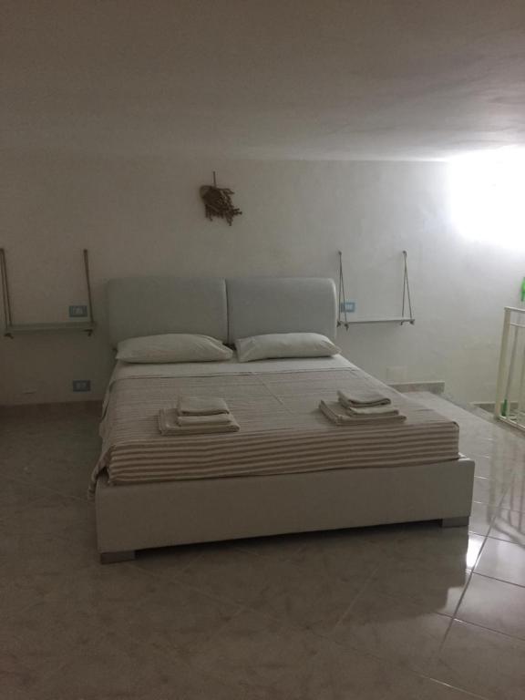 Posteľ alebo postele v izbe v ubytovaní La Dimora di Enea Via Indipendenza