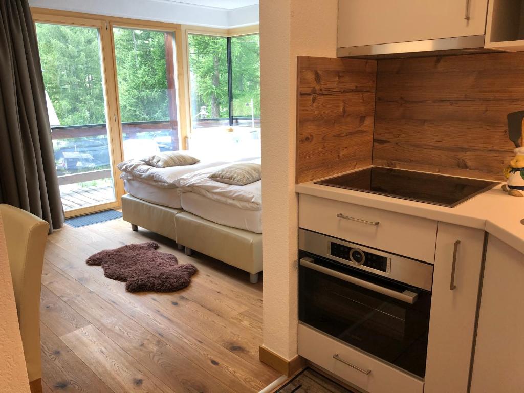 Kuchyň nebo kuchyňský kout v ubytování Haus Galileo