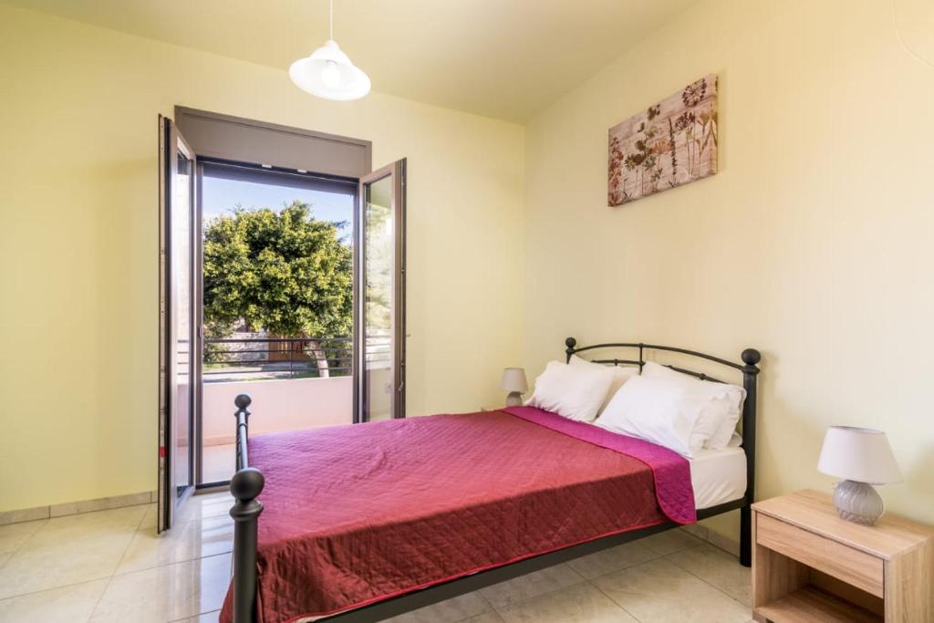 Postel nebo postele na pokoji v ubytování Villa Olive Tree