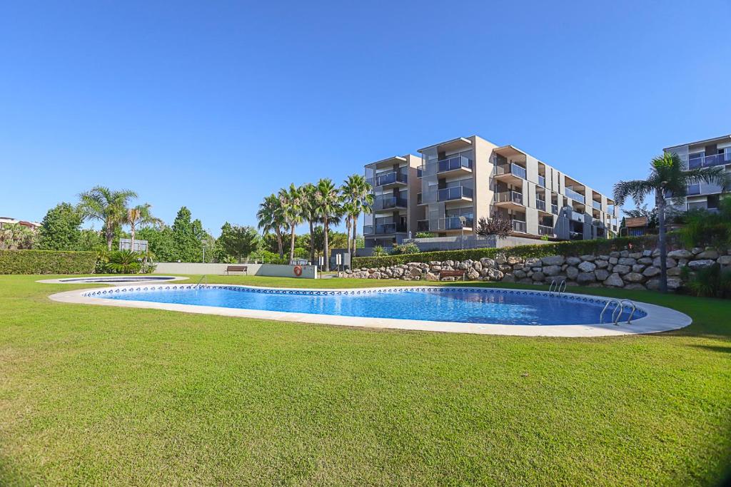 Bazén v ubytovaní DIFFERENTFLATS Paradise Village Families alebo v jeho blízkosti