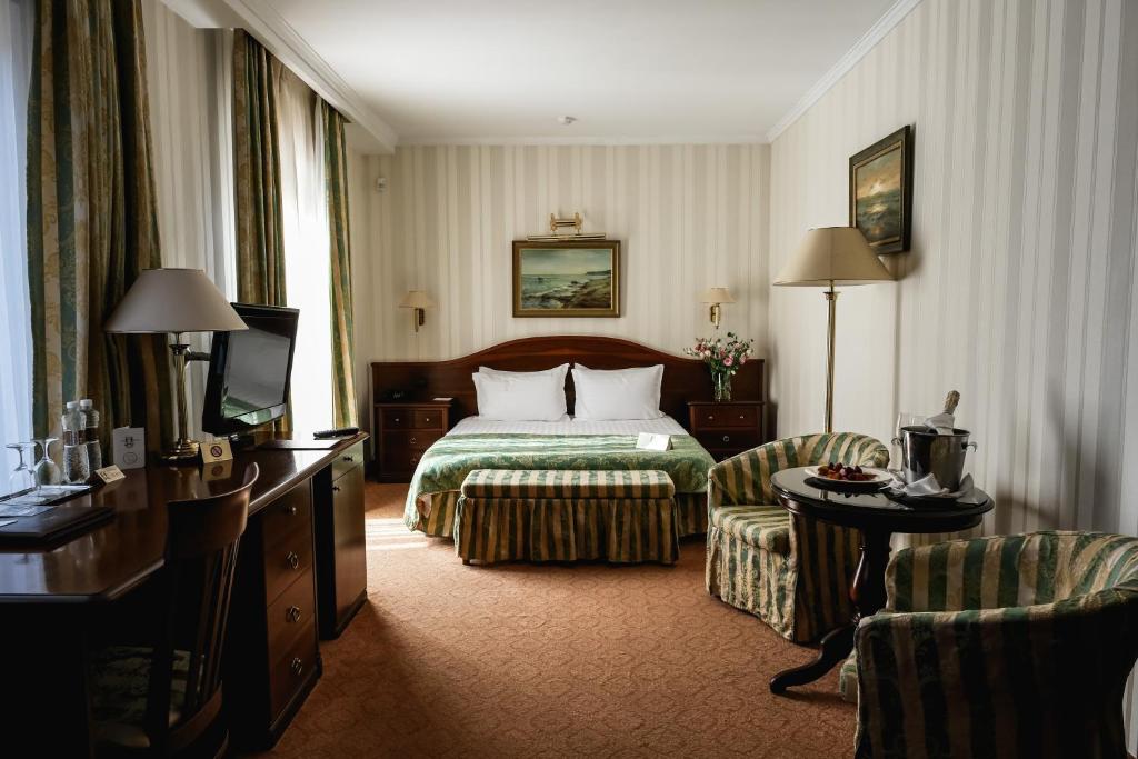 Postel nebo postele na pokoji v ubytování Hotel Otrada