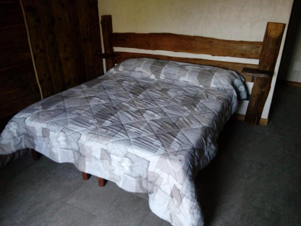 Postel nebo postele na pokoji v ubytování Agri-b&b Lou Col