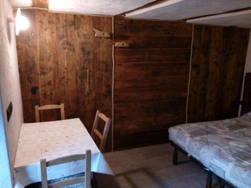 Postel nebo postele na pokoji v ubytování Agri-b&b Lou Col