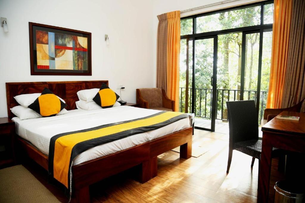 Postel nebo postele na pokoji v ubytování Spring Villas Kandy