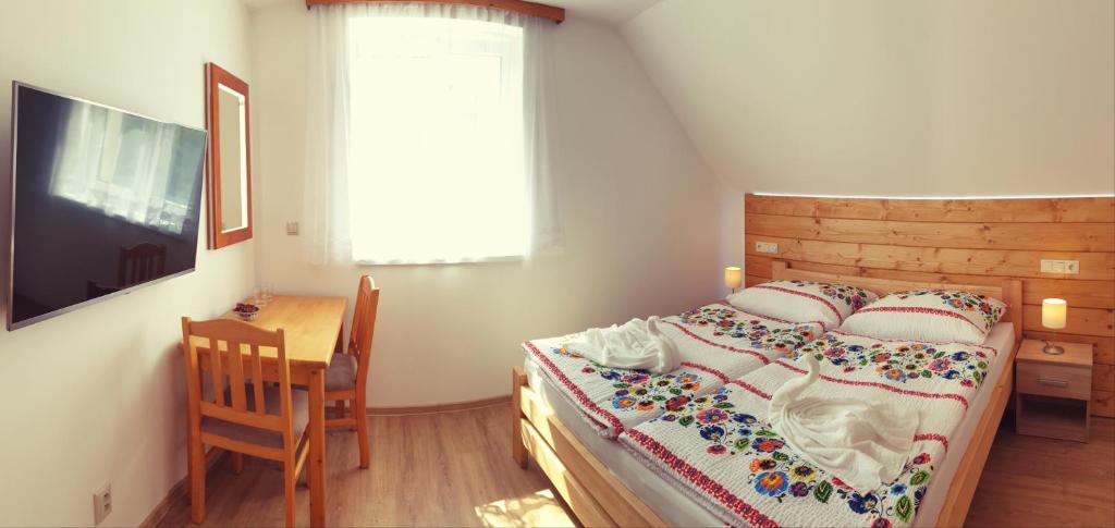Postel nebo postele na pokoji v ubytování Chalupa Anna