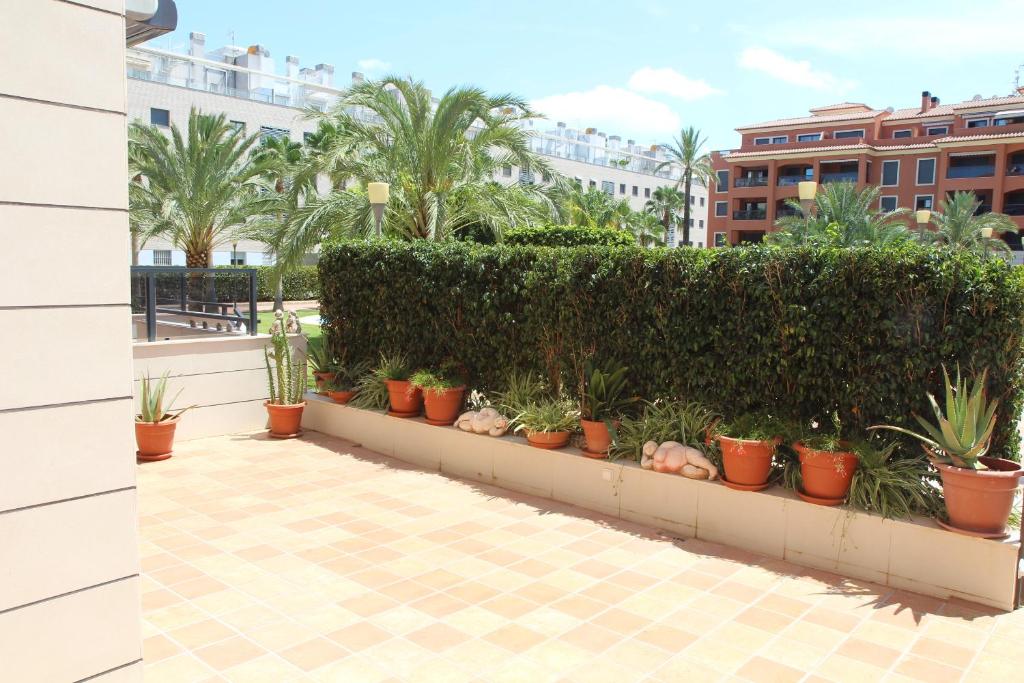 Zahrada ubytování Jardines de las Marinas - Apartamento en Denia - Terraza privada, piscinas, jaccuzi, padel y playa cerca