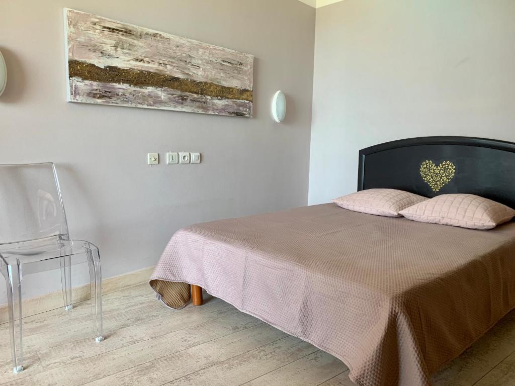 Postel nebo postele na pokoji v ubytování Hotel Celine