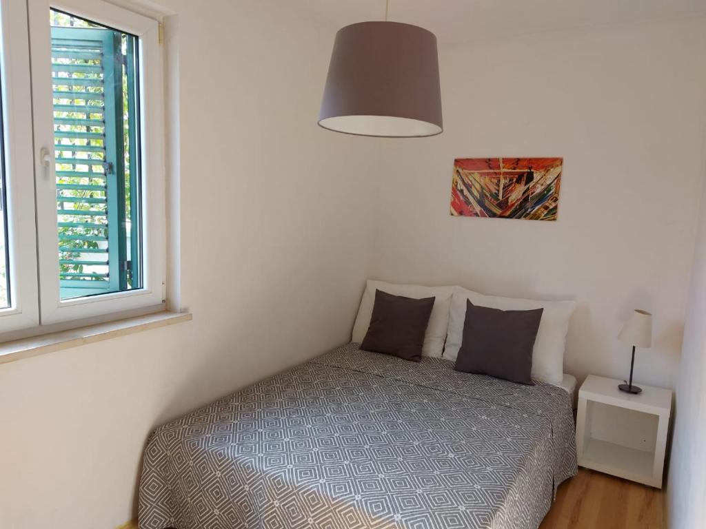 Posteľ alebo postele v izbe v ubytovaní Apartments Coral of Dubrovnik