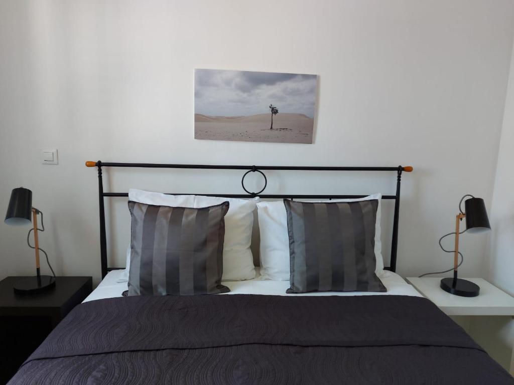 Posteľ alebo postele v izbe v ubytovaní Apartments Coral of Dubrovnik