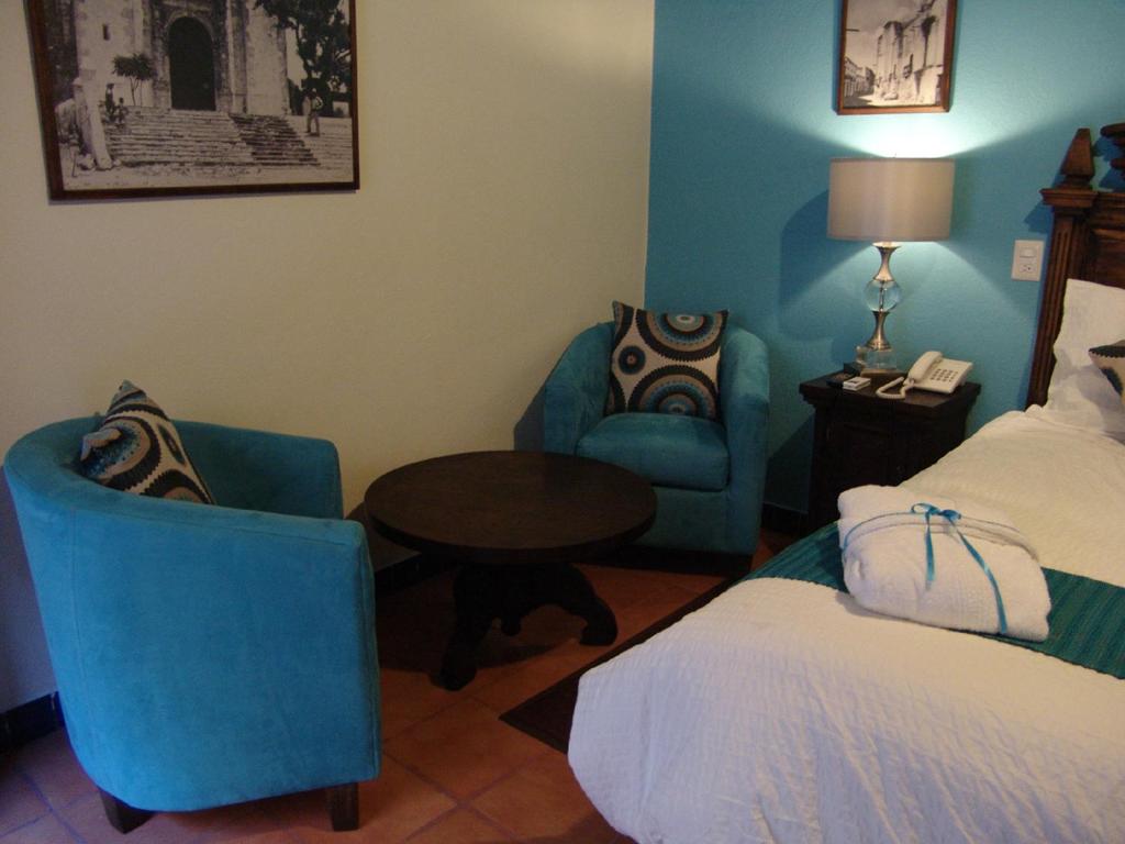 Postel nebo postele na pokoji v ubytování Casa del Tio Hotel Boutique